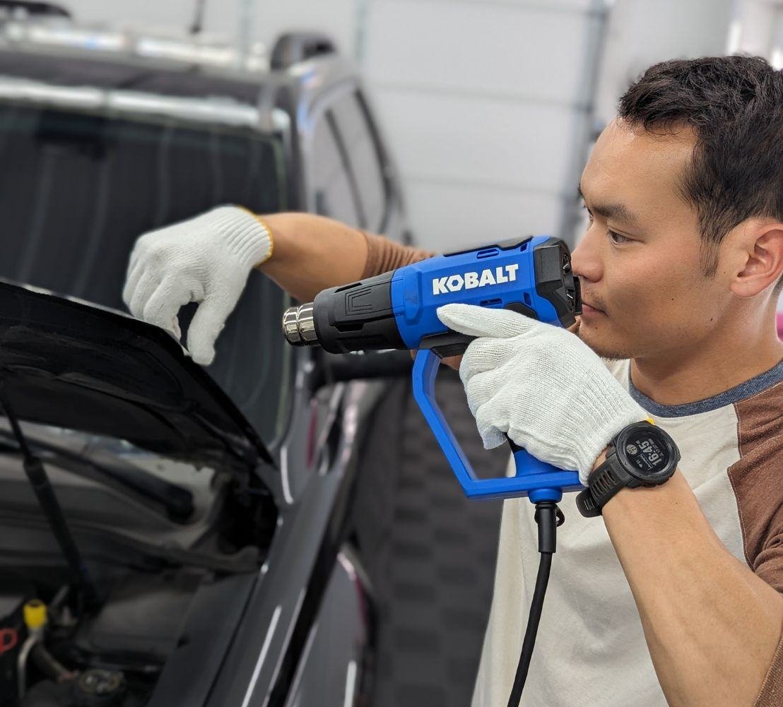 Paint protection film process on hood learn more https://compassautodetail.com/paint-protection-film/